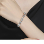 White Gold Plated Hearts Bangle Adjustable Bracelet with Crystal Accents – 7 inches - Image 3